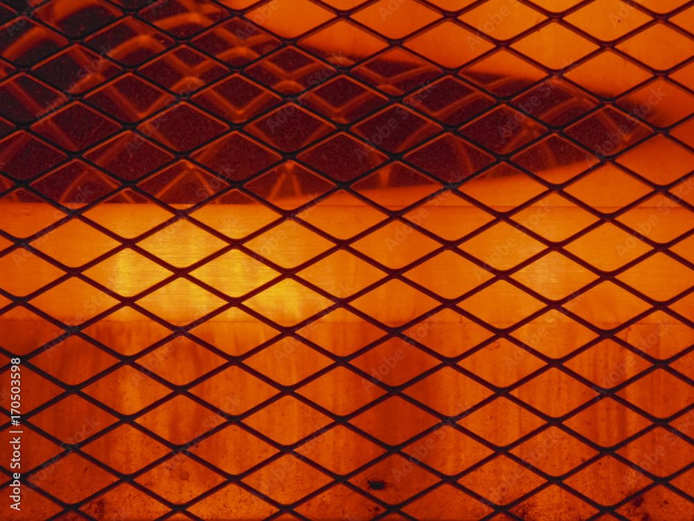 electric heater. electric heater. a protective grid and a reflector on a heater. electric heater. electric heater. a protective grid and a reflector on a heater.