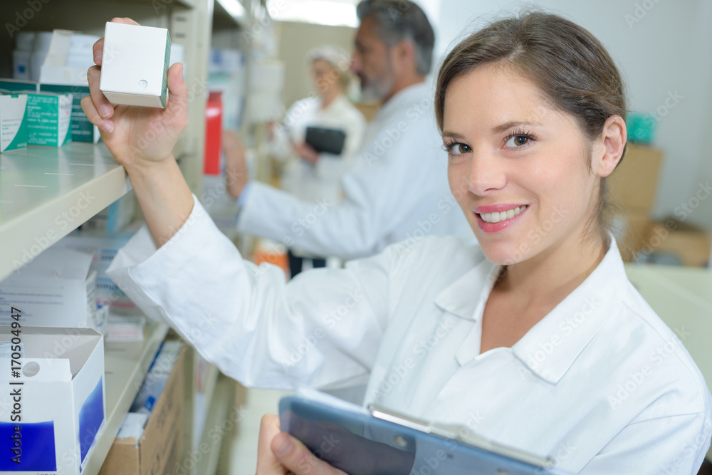 portrait of female pharmacists working in modern farmacy portrait of female pharmacists working in modern farmacy