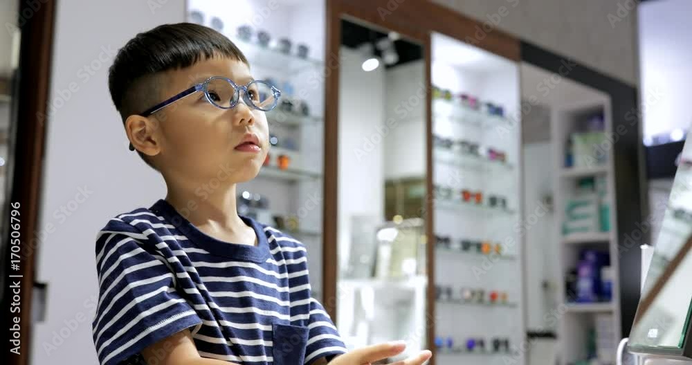 Little boy doing eye test