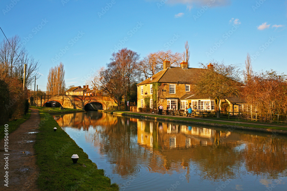 Traditional rural England scene on a canal towpath near Stoke Bruerne, in Northamptonshire, England
