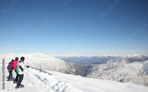 Skiers looking down from the Cardrona Ski Field near Wanaka, in Otago, on New Zealand's South Island in winter