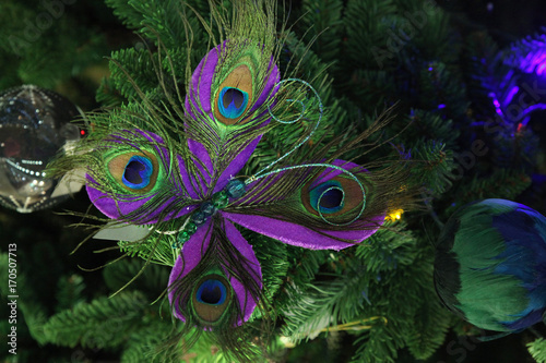 Christmas background, butterfly on the tree