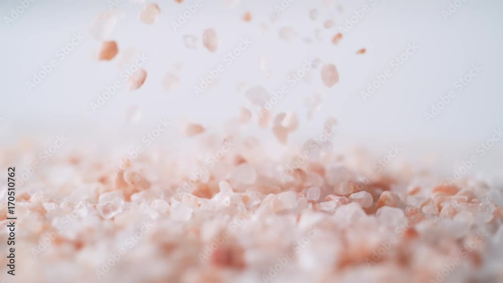 Himalayan rock salt falling. Shot with high speed camera, phantom flex 4K. Slow Motion.
