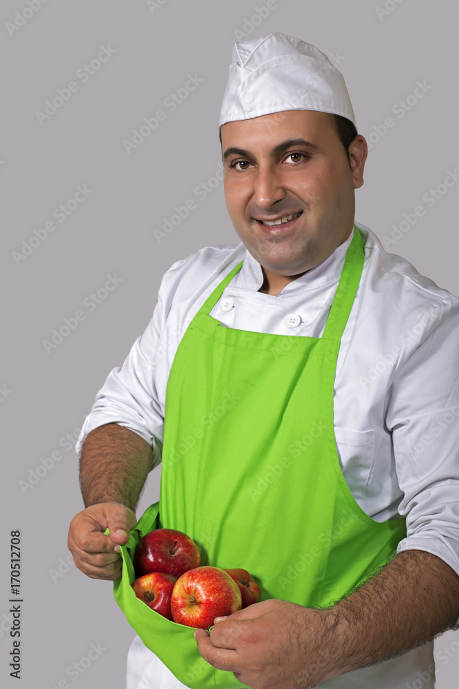 Dependiente de Frutería con Manzanas rojas Dependiente de Frutería con Manzanas rojas
