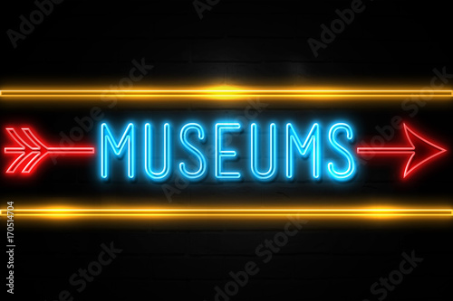 Billede på lærred Museums  - fluorescent Neon Sign on brickwall Front view