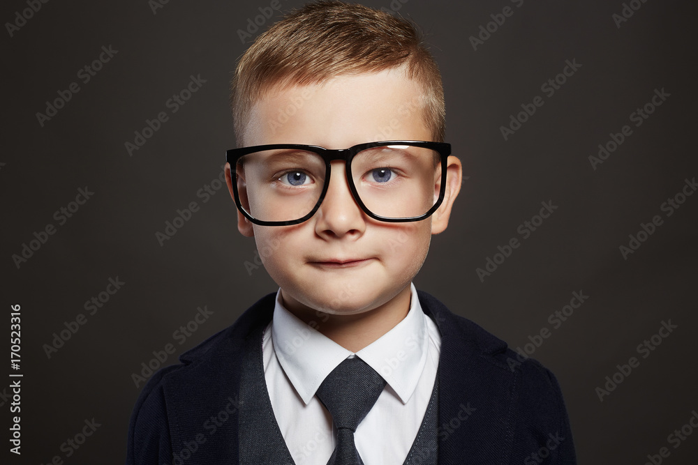 funny child in suit and glasses