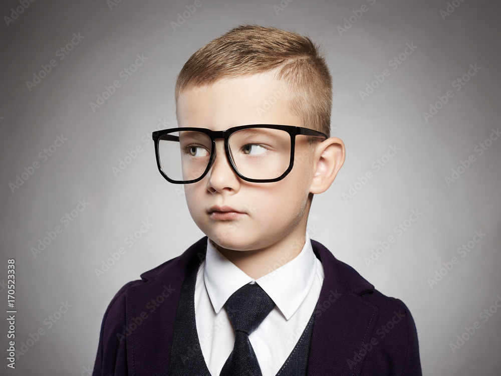 funny child in suit and glasses