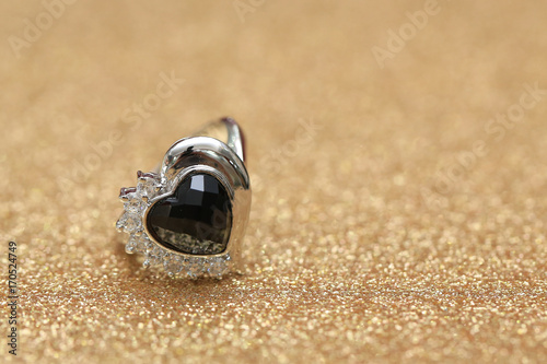 diamond ring and black gemstone