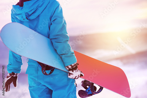 Closeup woman back snowboarder snowboard snowboarding