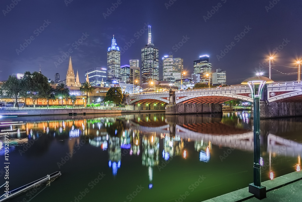 Melbourne, Australia - Long exposure image of City skyline of Melbourne downtown, Princess Bridge,  Yarra River and business building at night