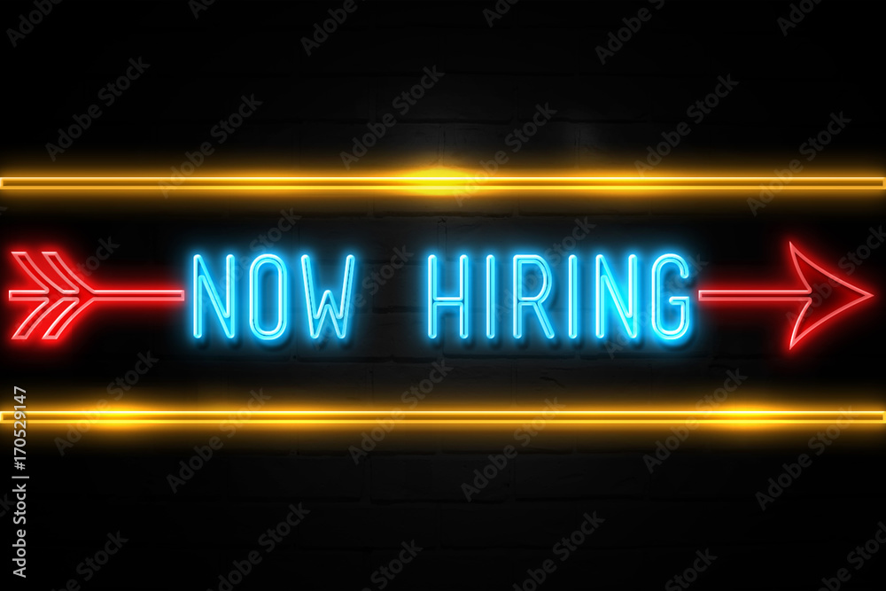 Now Hiring  - fluorescent Neon Sign on brickwall Front view