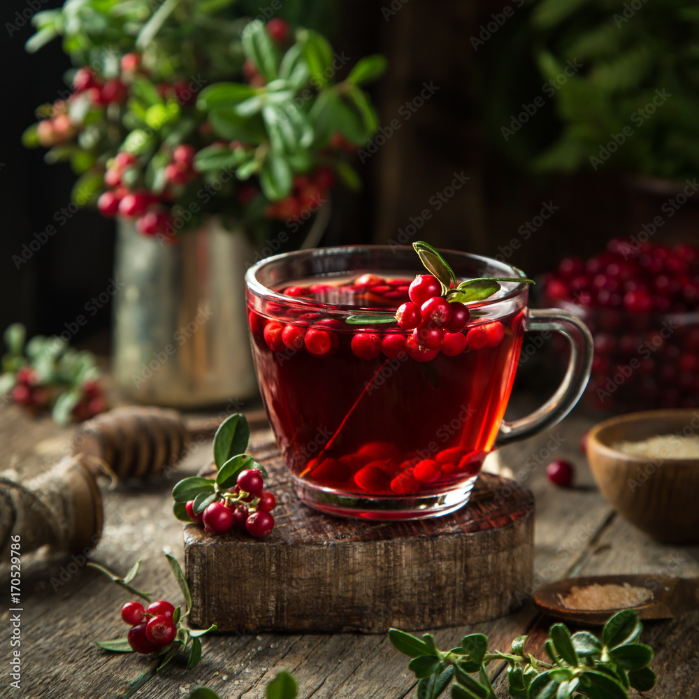 cup of hot lingonberry (or cranberry) tea cup of hot lingonberry (or cranberry) tea