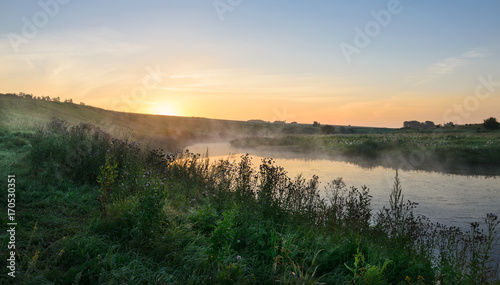 Summer foggy morning.Sunrise.River Upa in Tula region Russia.
