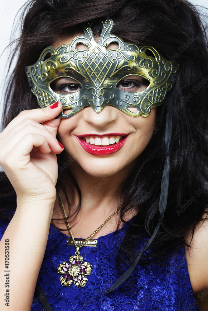 lifestyle and people concept: beautiful brunette woman with mask