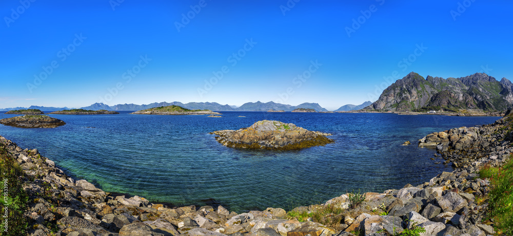 Scenic view of the waterfront harbor in Henningsvaer in summer.