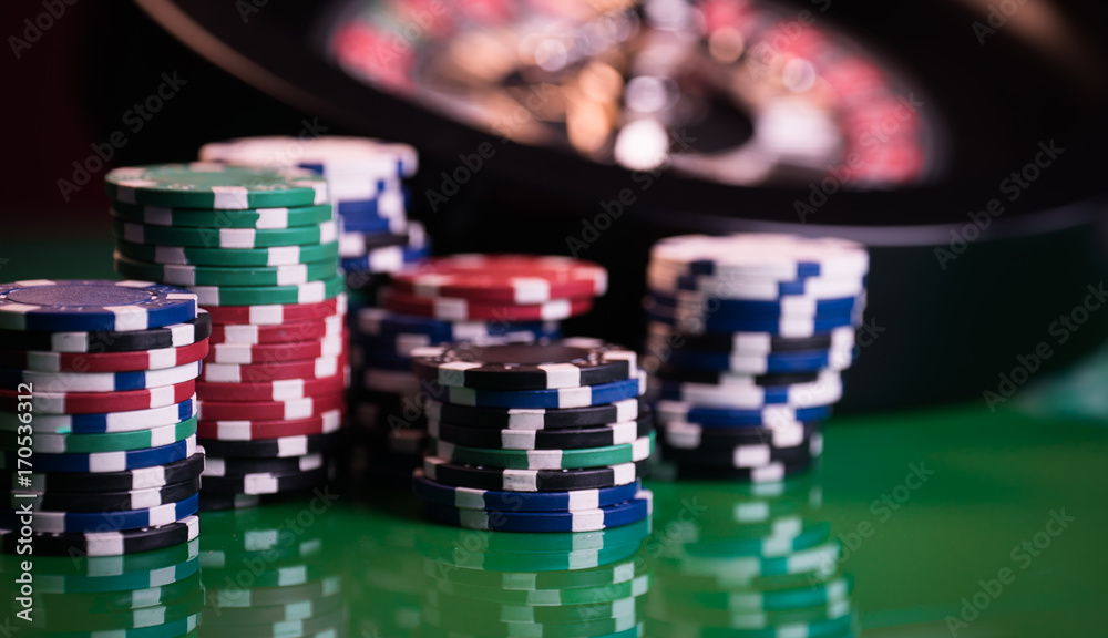 Roulette in casino and Poker Chips Roulette in casino and Poker Chips