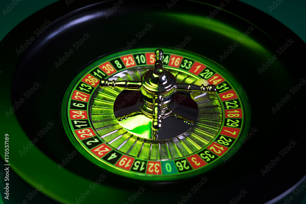 Roulette in casino and Poker Chips Roulette in casino and Poker Chips