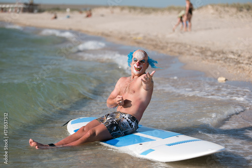 The man in the mask sitting in sup