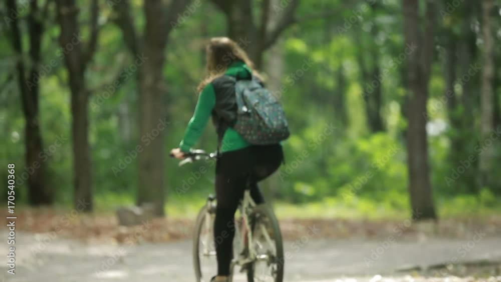 Couple Together Ride A Bicycle