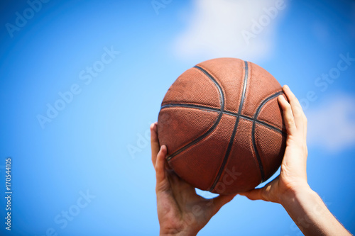 man holding a basketball © fox17