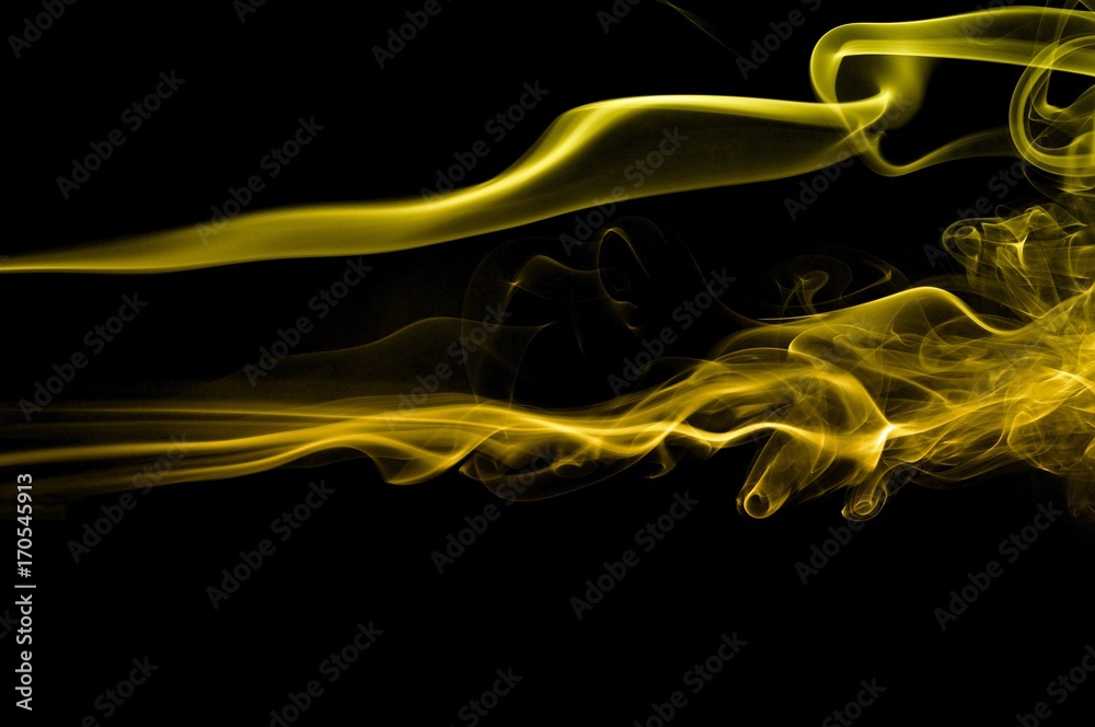 Abstract gold smoke on black background, gold background,gold ink background Abstract gold smoke on black background, gold background,gold ink background