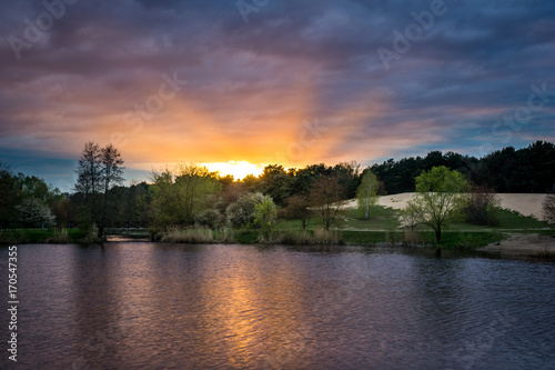 Fototapeta Naklejka Na Ścianę i Meble -  Sunset over pond in Zalesie Dolne, Poland