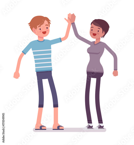 Young man and woman giving high five