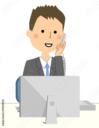 ビジネスマン　PCと電話
