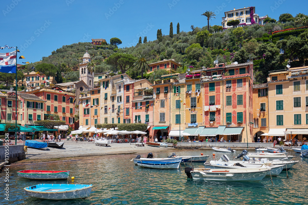Portofino beautiful village with colorful houses in Italy in a clear sunny summer day