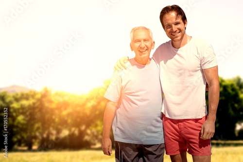 Composite image of happy senior man with his adult son