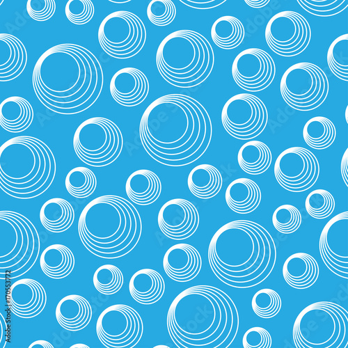 transparent soap bubbles on blue background
