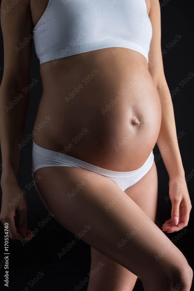 Naklejka premium belly of pregnant woman