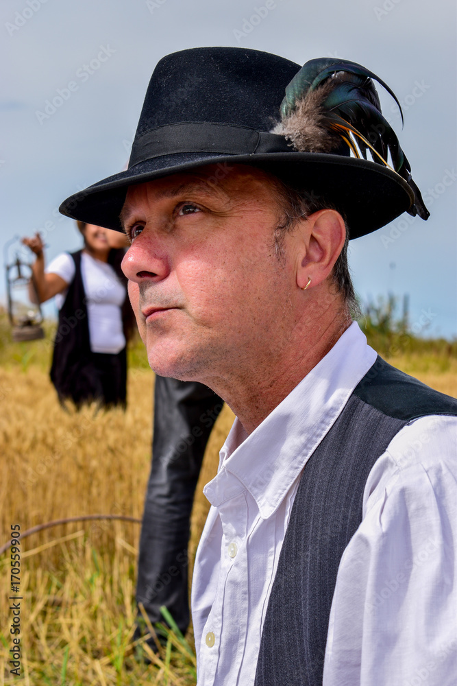portrait of man with hat on the field,city of Zrenjanin,Serbia,10th of July,2017. portrait of man with hat on the field,city of Zrenjanin,Serbia,10th of July,2017.