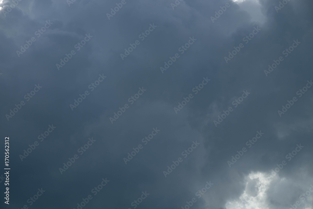 Obraz premium rain cloud dark motion at sunset light background