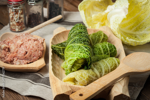 Cabbage rolls stuffed with meat and grits.