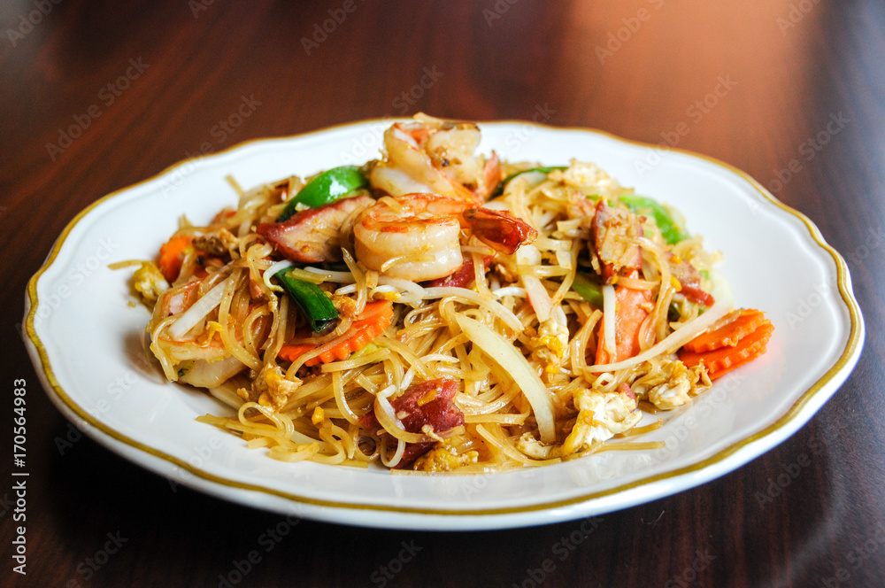 Stir-Fried Noodles, Thin rice noodles with shrimp, BBQ pork, bell peppers, onions, eggs, carrots & bean sprouts. Stir-Fried Noodles, Thin rice noodles with shrimp, BBQ pork, bell peppers, onions, eggs, carrots & bean sprouts.