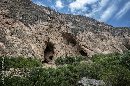 The road to the monastery complex Noravank./Armenia. Rocks with many grottoes and caves on the way to the monastery complex Noravank.