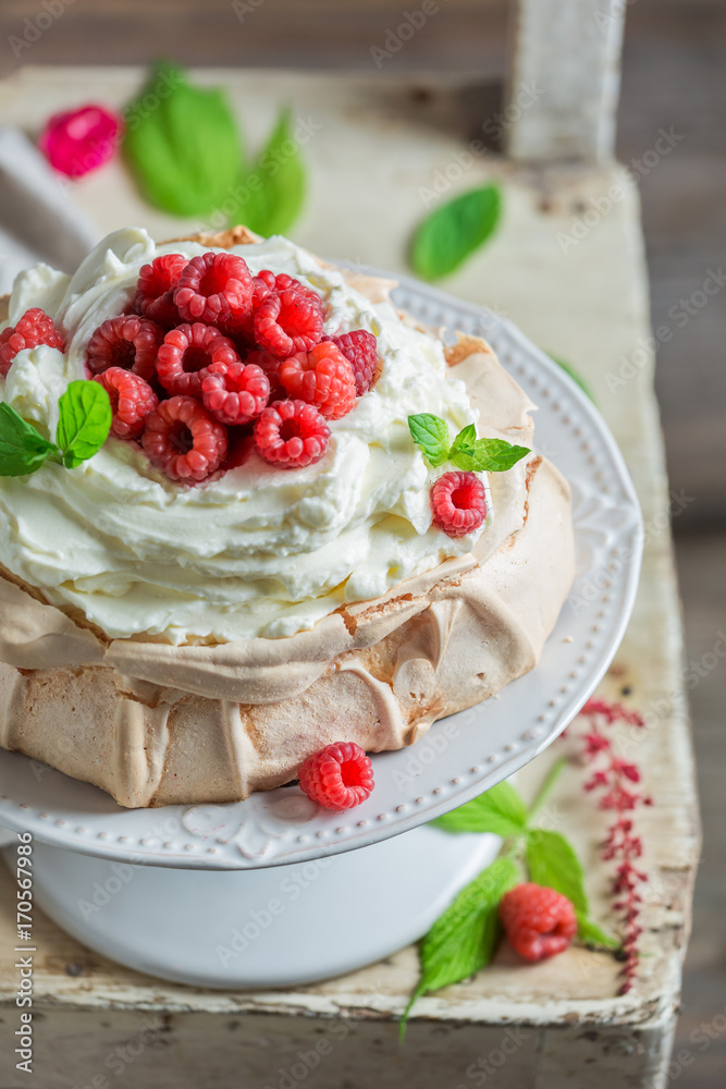 Homemade and rustic Pavlova dessert made of mascarpone and berries