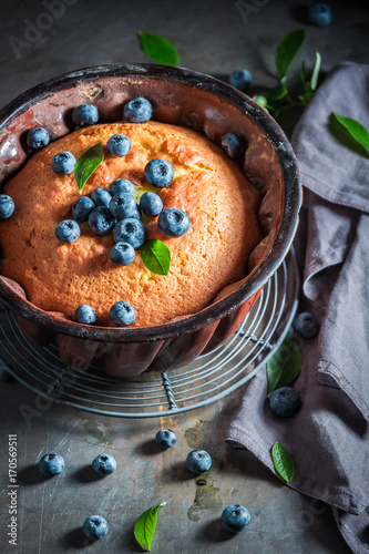 Homemade and rustic blueberries cake with fresh fruits