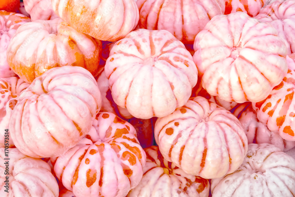 Obraz premium photo natural handmade soaps in the form of tangerines, peeled mandarins from peel with lobules as a background