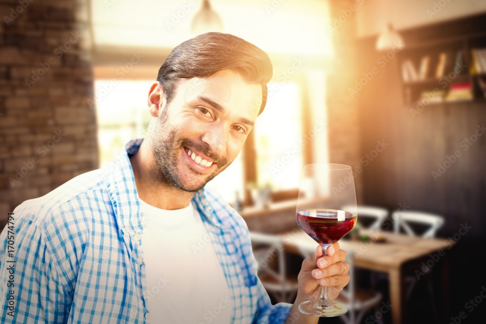 Composite image of smiling man with red wine Composite image of smiling man with red wine