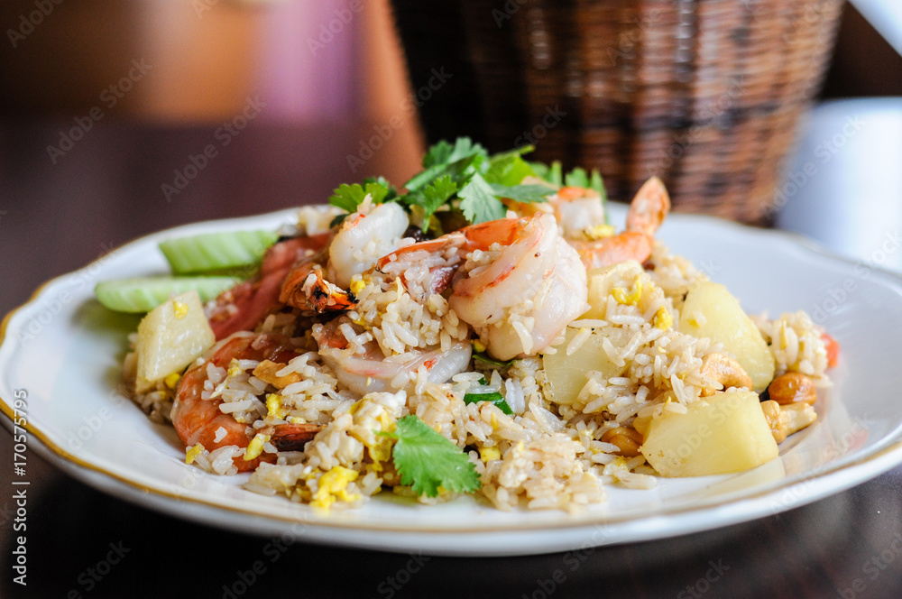 Pineapple Fried Rice, Stir-fried rice with egg, pineapple, raisins, cashew nuts, green onions and tomatoes. Pineapple Fried Rice, Stir-fried rice with egg, pineapple, raisins, cashew nuts, green onions and tomatoes.
