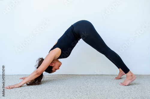 Yoga students showing different yoga poses
