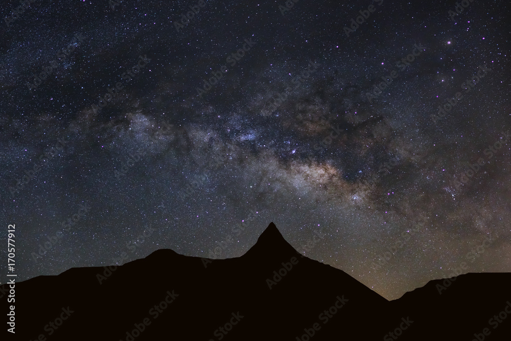 Starry night sky with high moutain and milky way galaxy with stars and space dust in the universe Starry night sky with high moutain and milky way galaxy with stars and space dust in the universe