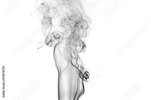 Black smoke on a white background,Abstract black smoke swirls over white background, fire smoke