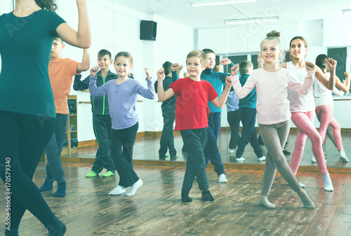 Children dancing contemp in studio smiling and having fun