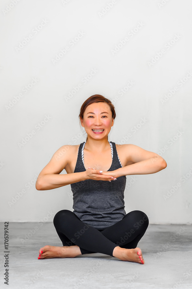 Yoga students showing different yoga poses Yoga students showing different yoga poses