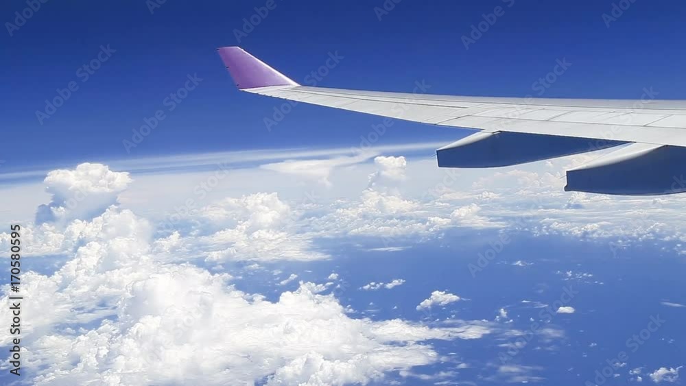 airplane wing in flight on beautiful sky airplane wing in flight on beautiful sky