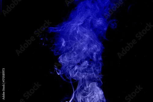 Fototapeta Naklejka Na Ścianę i Meble -  movement of smoke, abstract blue smoke on black background, smoke background ,blue smoke background, blue ink