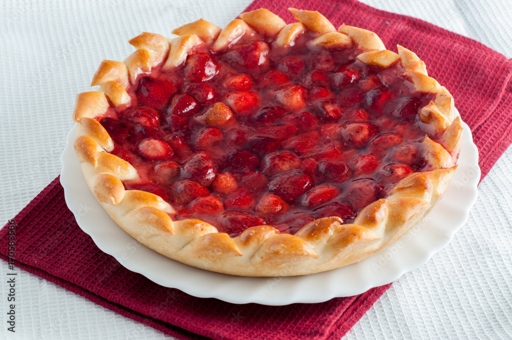 Berry sweet round pie on a table napkin Berry sweet round pie on a table napkin